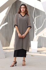 Polka dotted black dress