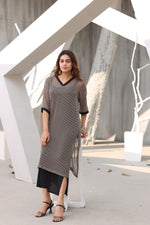 Polka dotted black dress